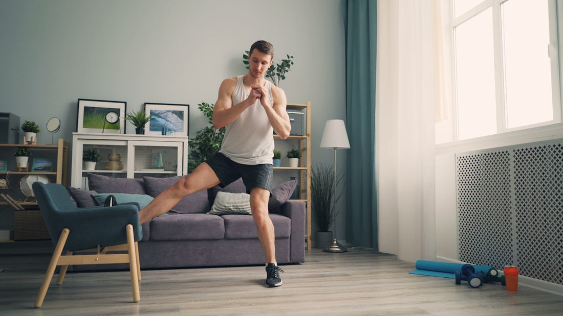 a man is dancing in a living room