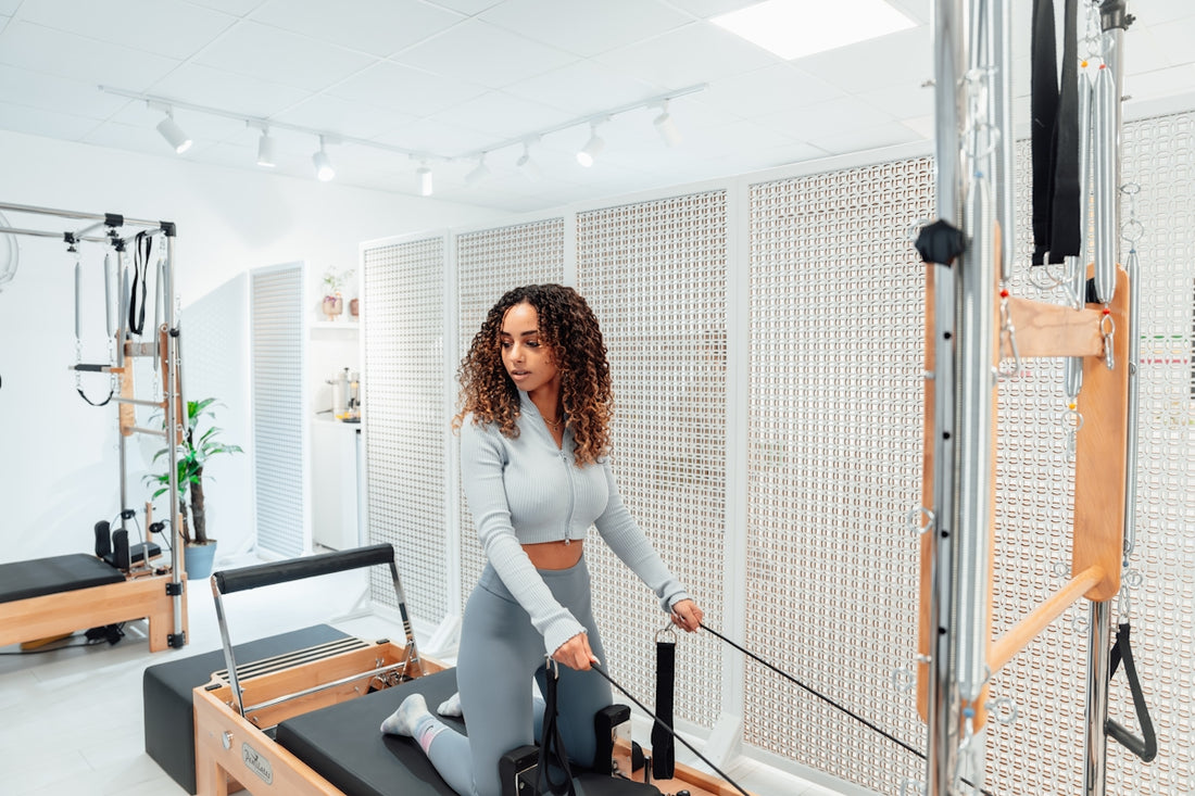 a woman in a gym with a gym equipment