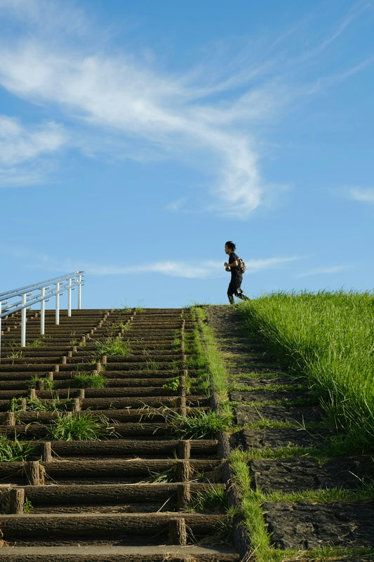 A man standing on top of a set of stairs