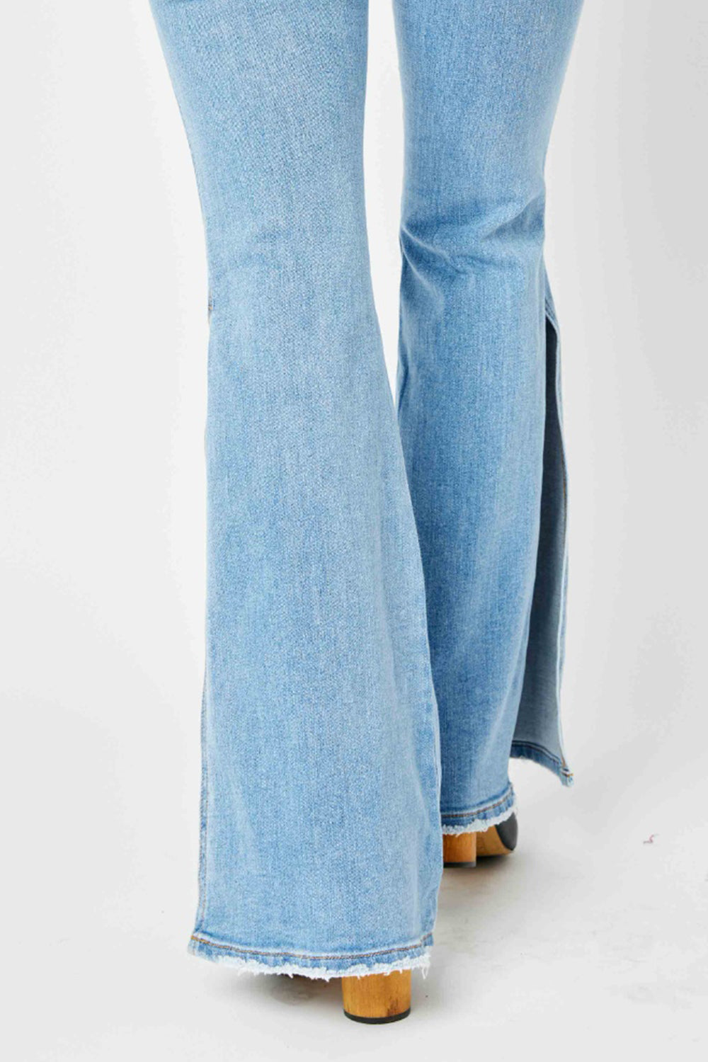 Judy Blue Full Size Mid Rise Raw Hem Slit Flare Jeans - Jeans - FITGGINS