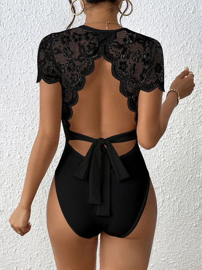 Perfee Lace Backless Round Neck Bodysuit Fitggins