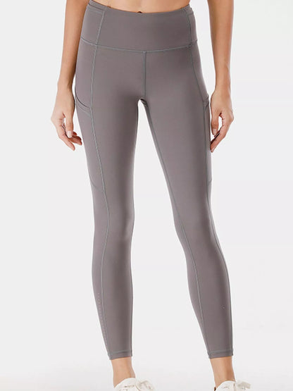 Full Size High-Waisted Active Leggings with Pockets Plus Size Fitggins
